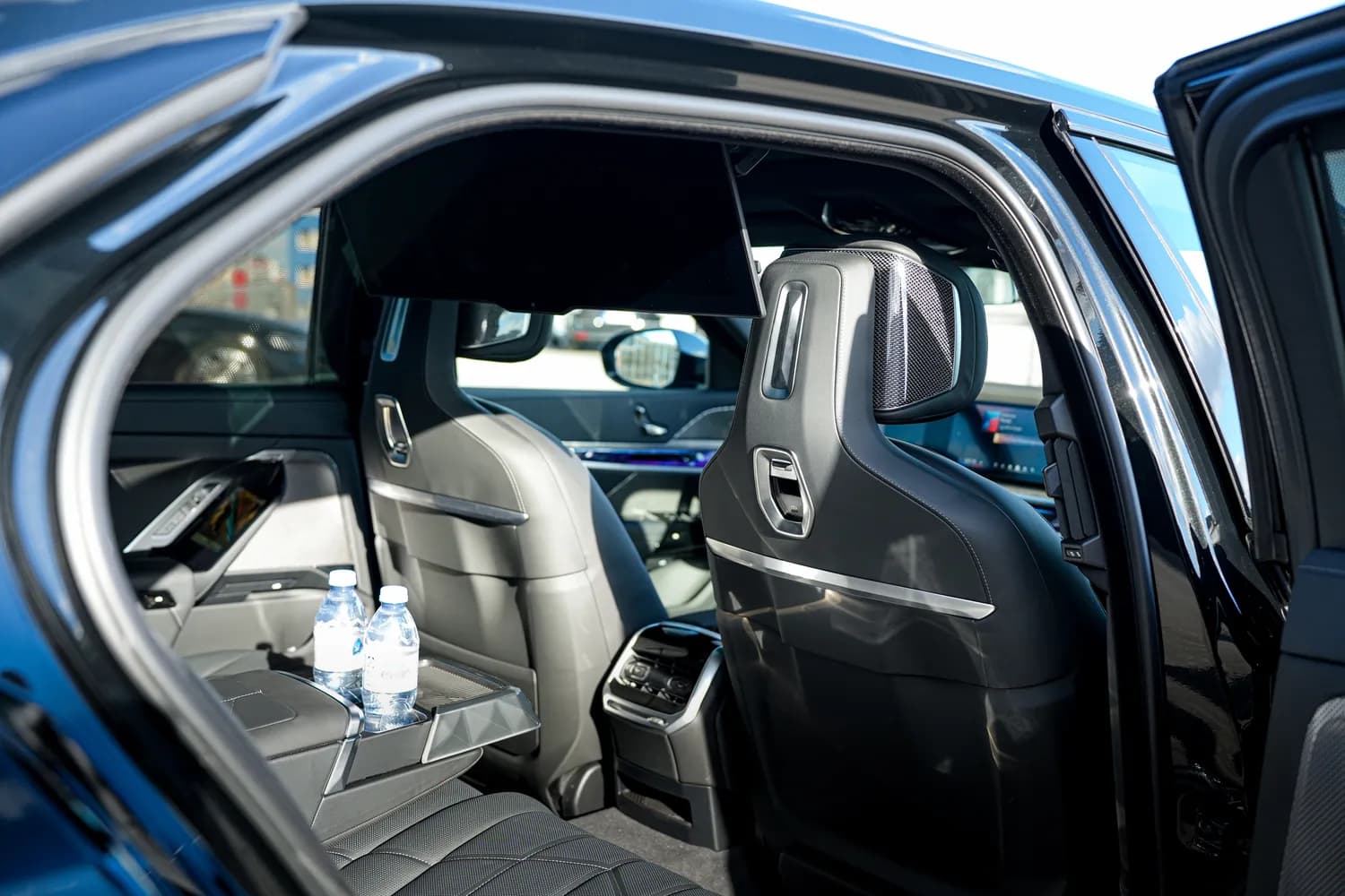 BMW 7 Series cabin, rear seats with door open