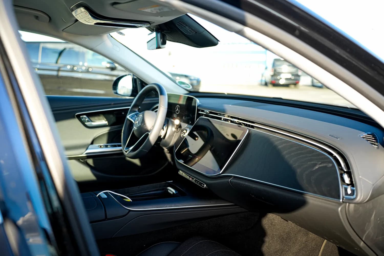 Mercedes-Benz E-Class cabin, dashboard and open door
